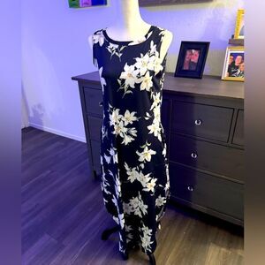 Brand new floral dress with tags, size small beautiful colors